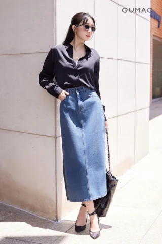 Chân váy jean đen xẻ tà phối với áo cúp ngực đi tiệc
