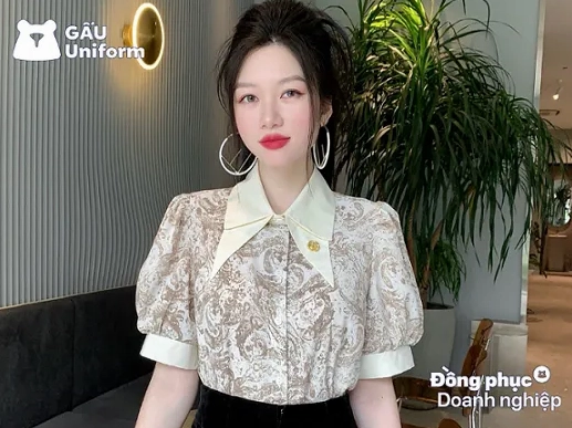 Tổng Hợp Các Kiểu Áo Sơ Mi Nữ Tay Lỡ Đẹp Nhất 2026 Cô gái trẻ trung diện áo sơ mi nữ tay lỡ form rộng