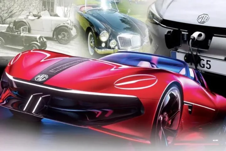 Một chiếc xe MG di chuyển trên đường phố hiện đại