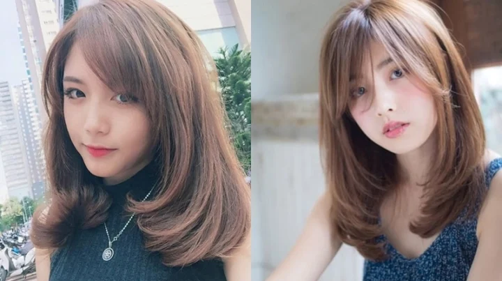 Tóc uốn lọn to ngang vai cho mặt tròn